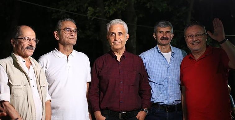Turkish cartoonist Musa Kart and four of his colleagues at Cumhuriyet newspaper absolved